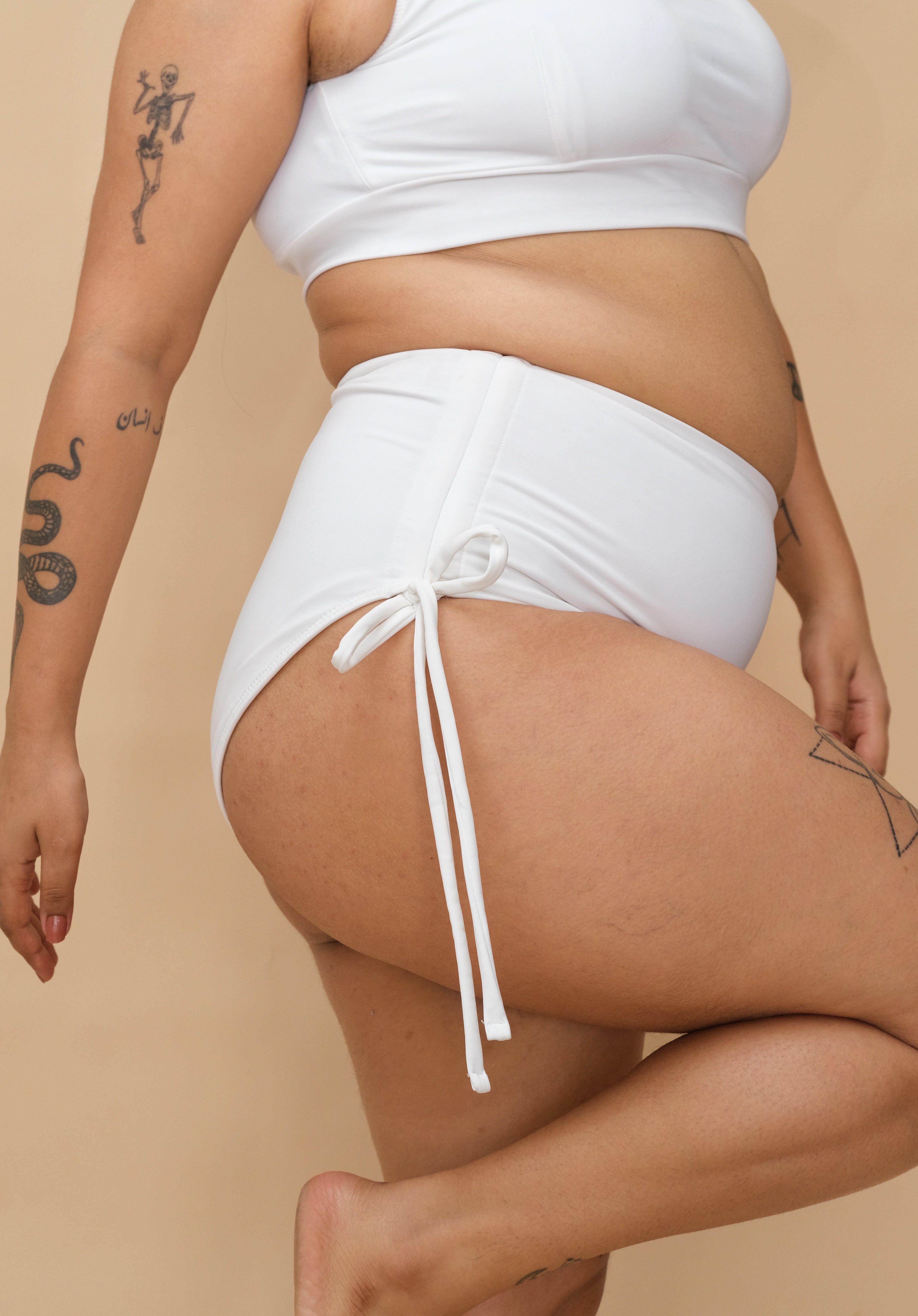 Woman wearing a white bikini set