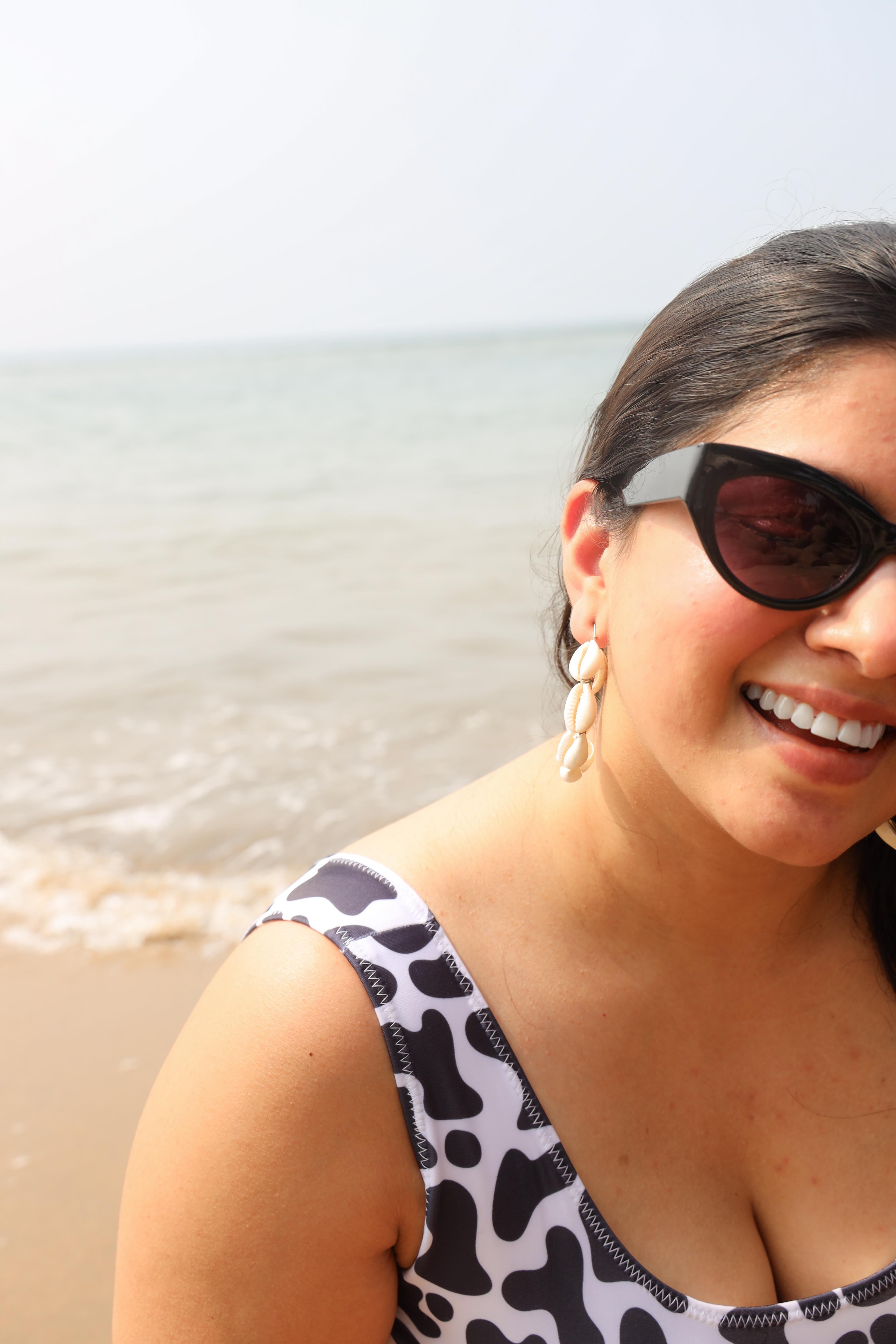 Woman in a cow print top 