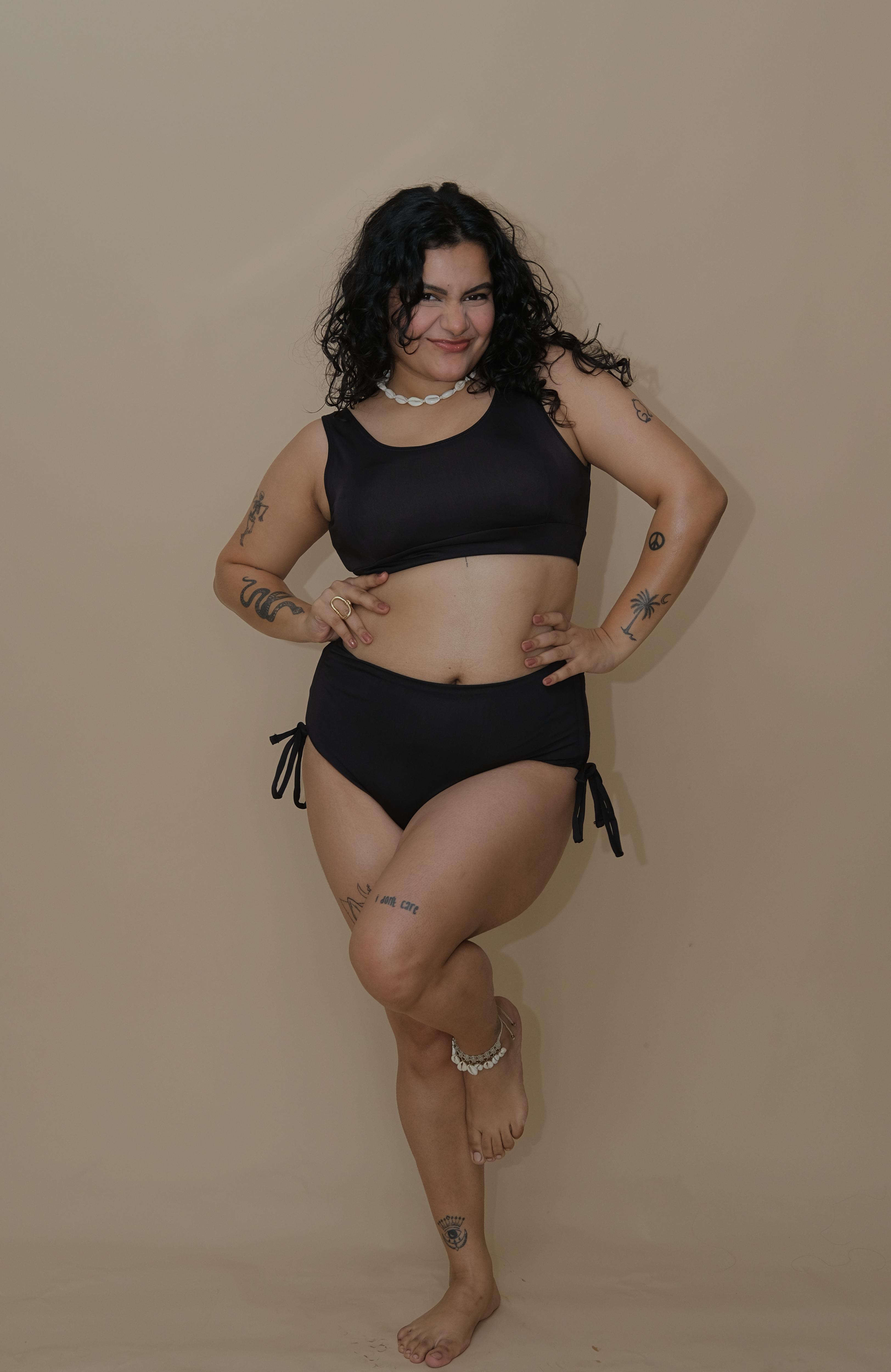 Woman wearing a black bikini set