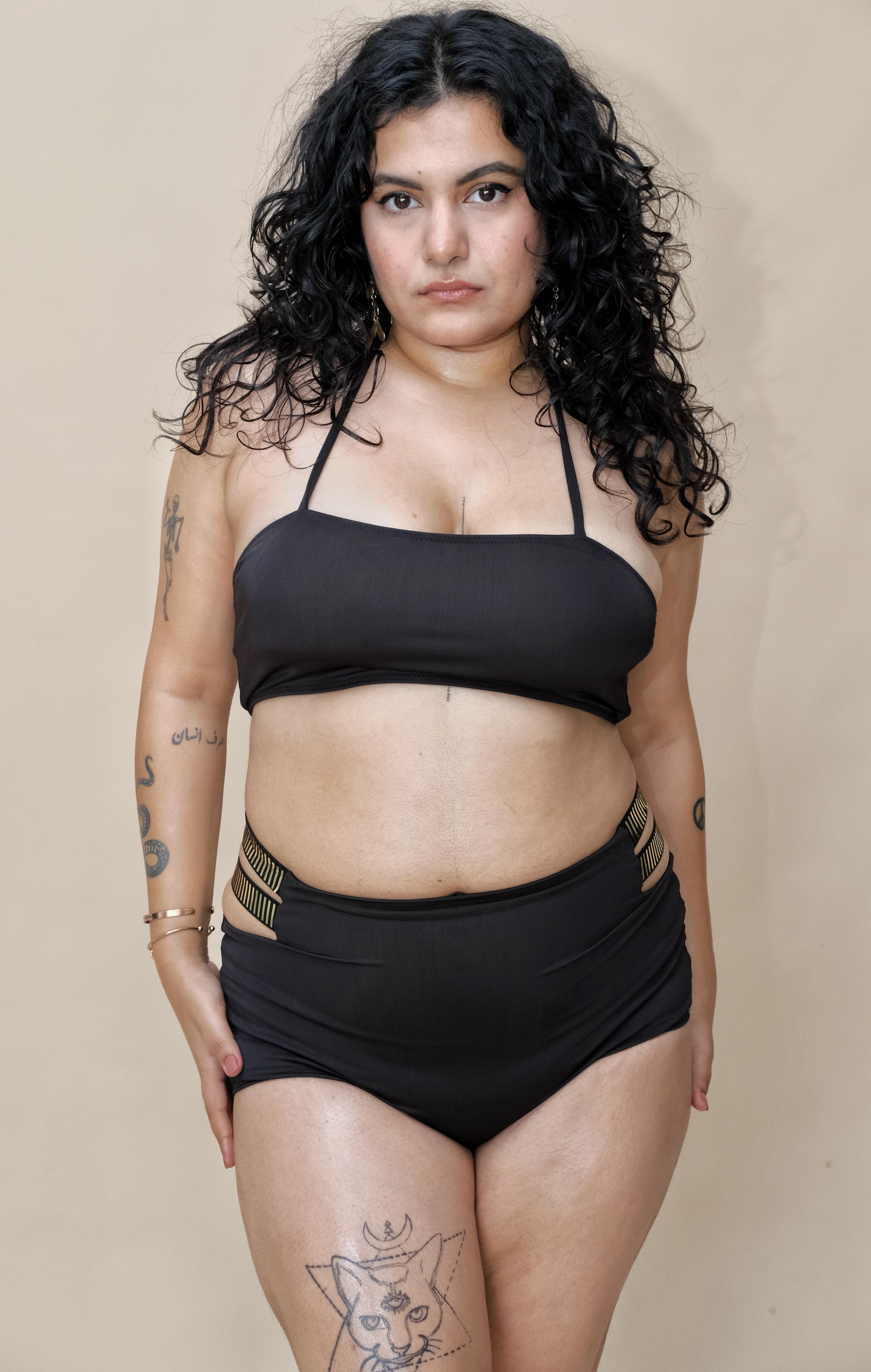 Woman wearing a black bikini set