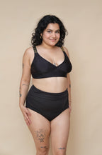 Woman wearing a black bikini set