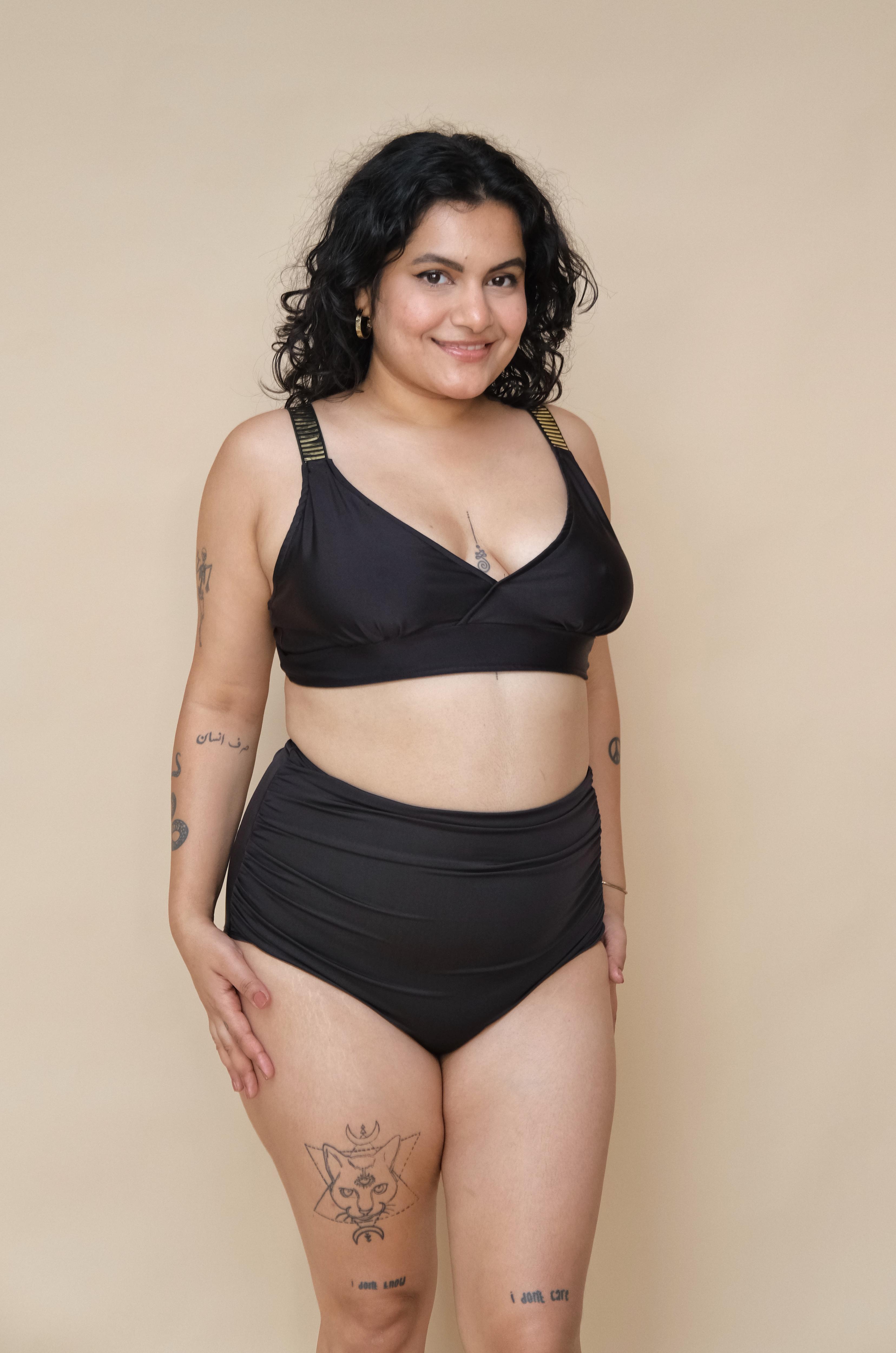 Woman wearing a black bikini set