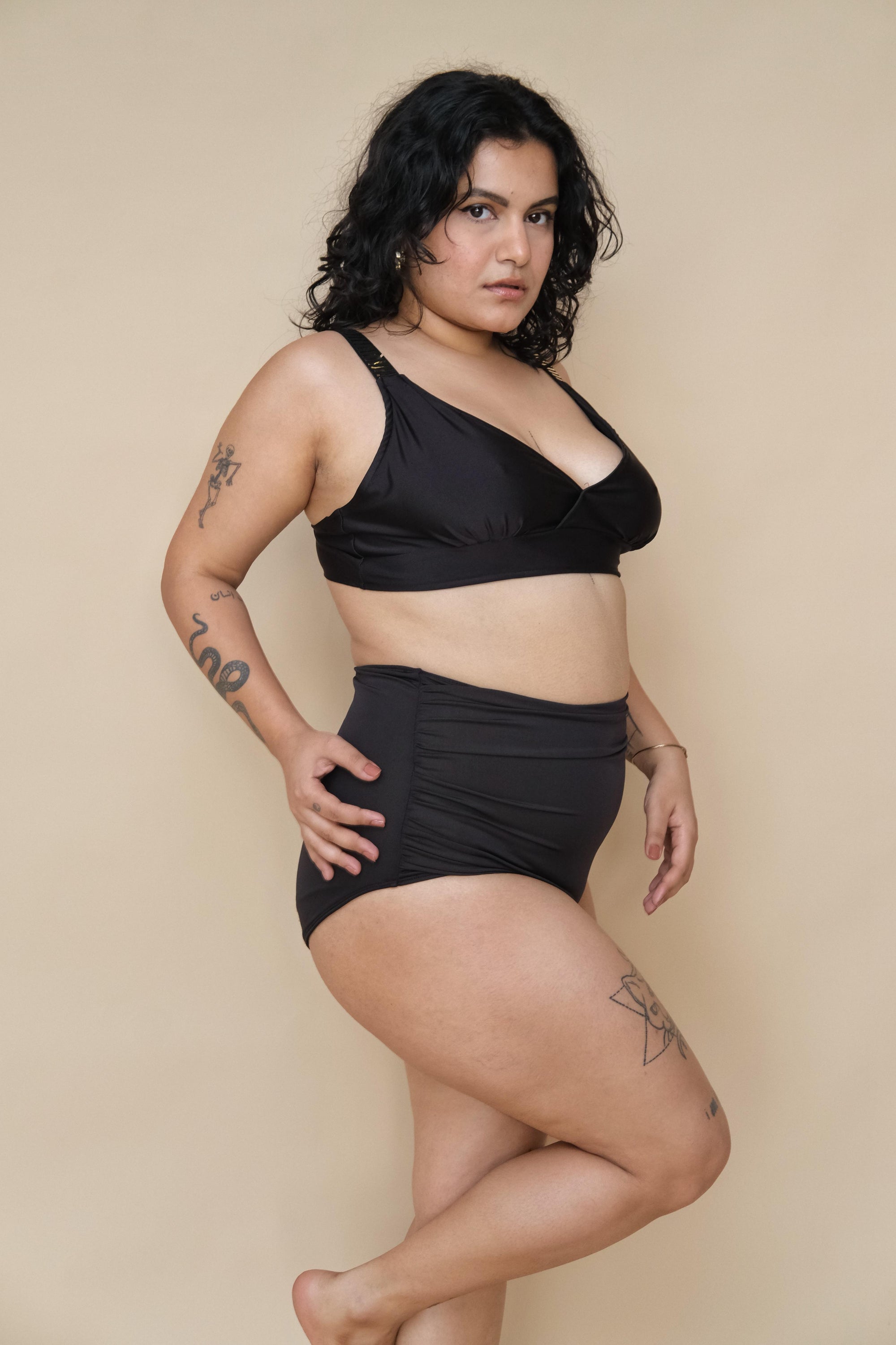 Woman wearing a black bikini set