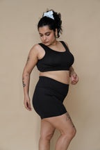 Woman wearing a black swim set