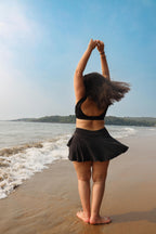 Woman in black swim set