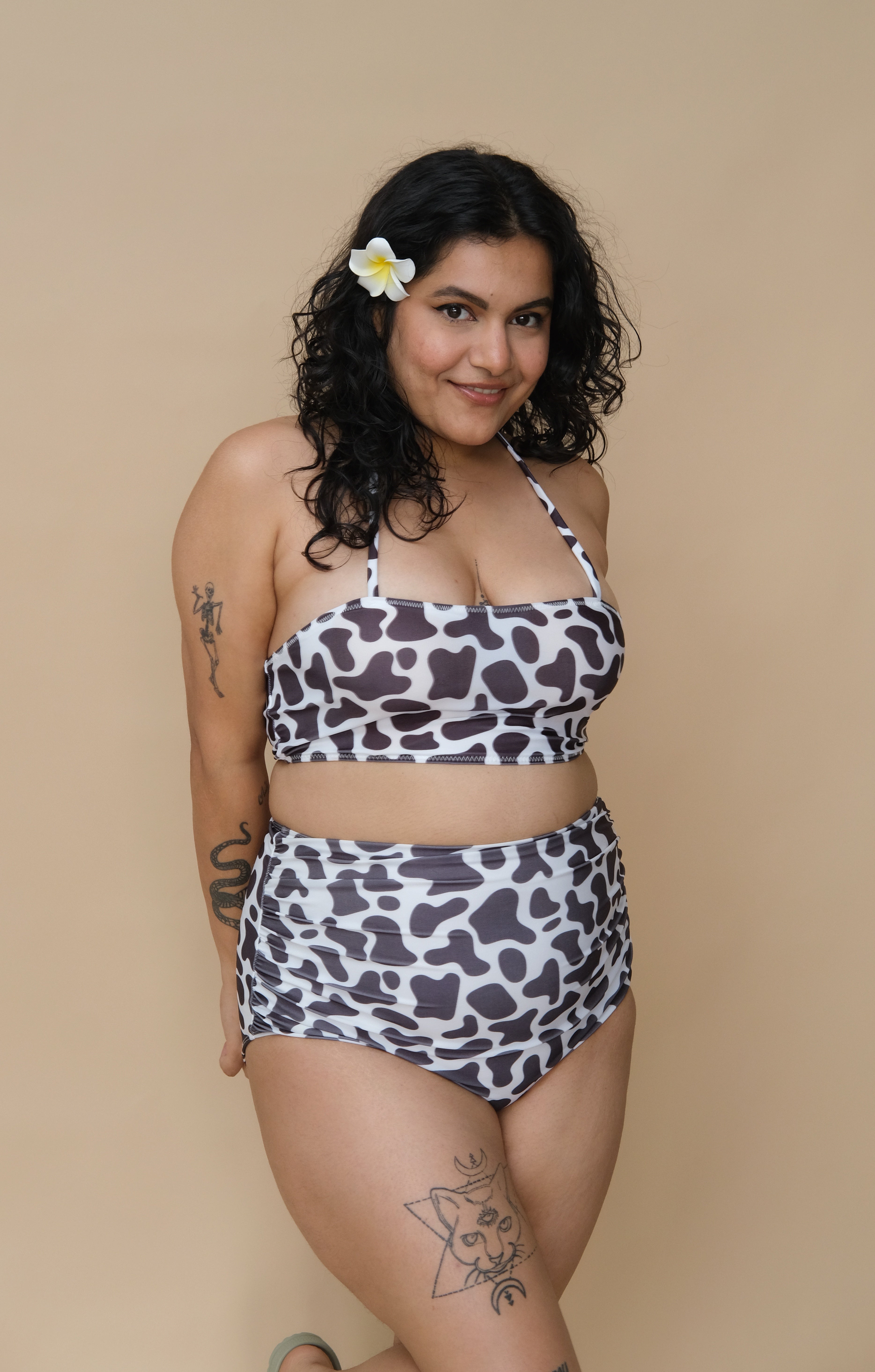 Woman wearing a patterned two-piece swimsuit