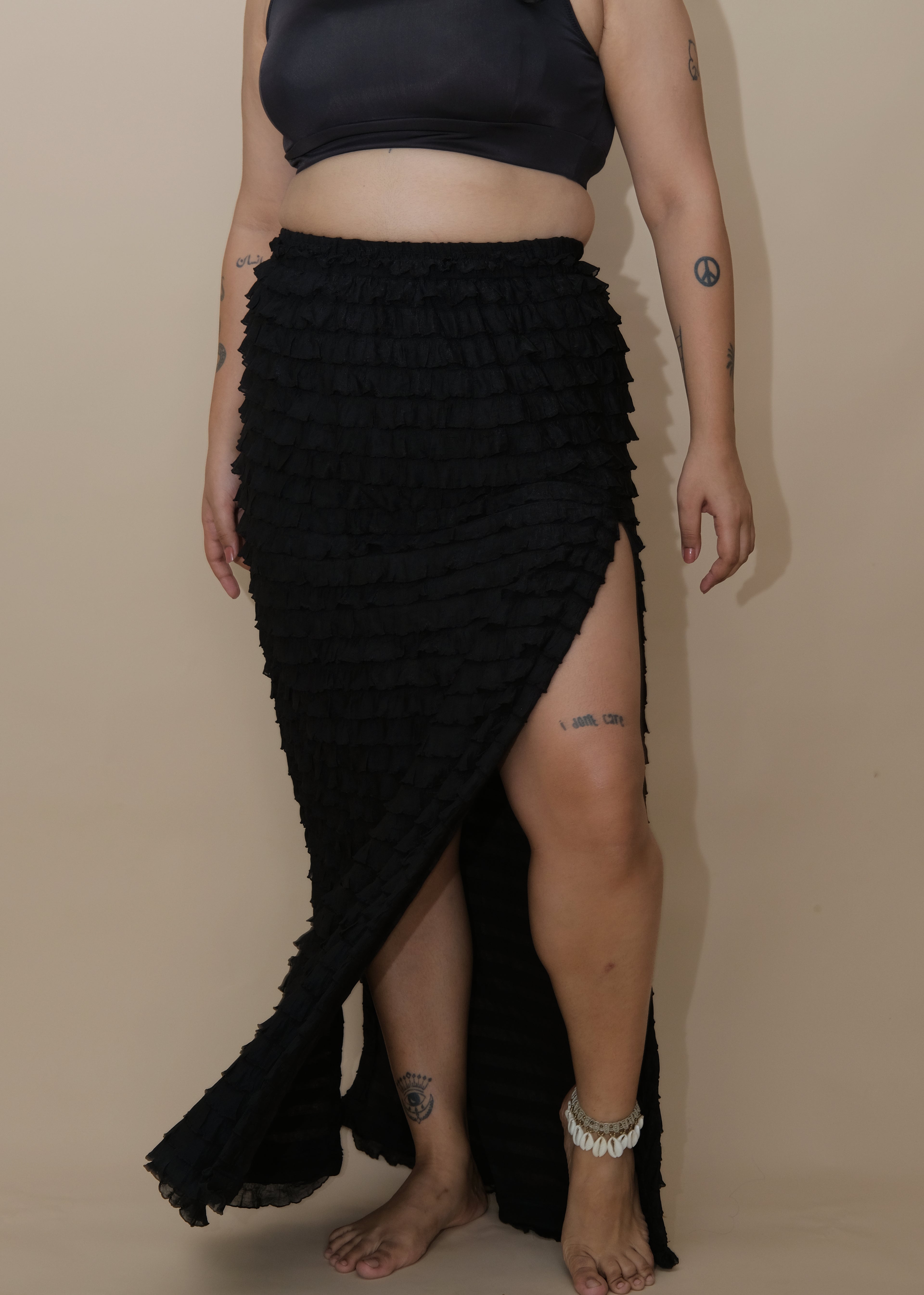 Woman wearing a black textured skirt 