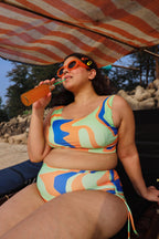 Woman in colorful swimsuit set