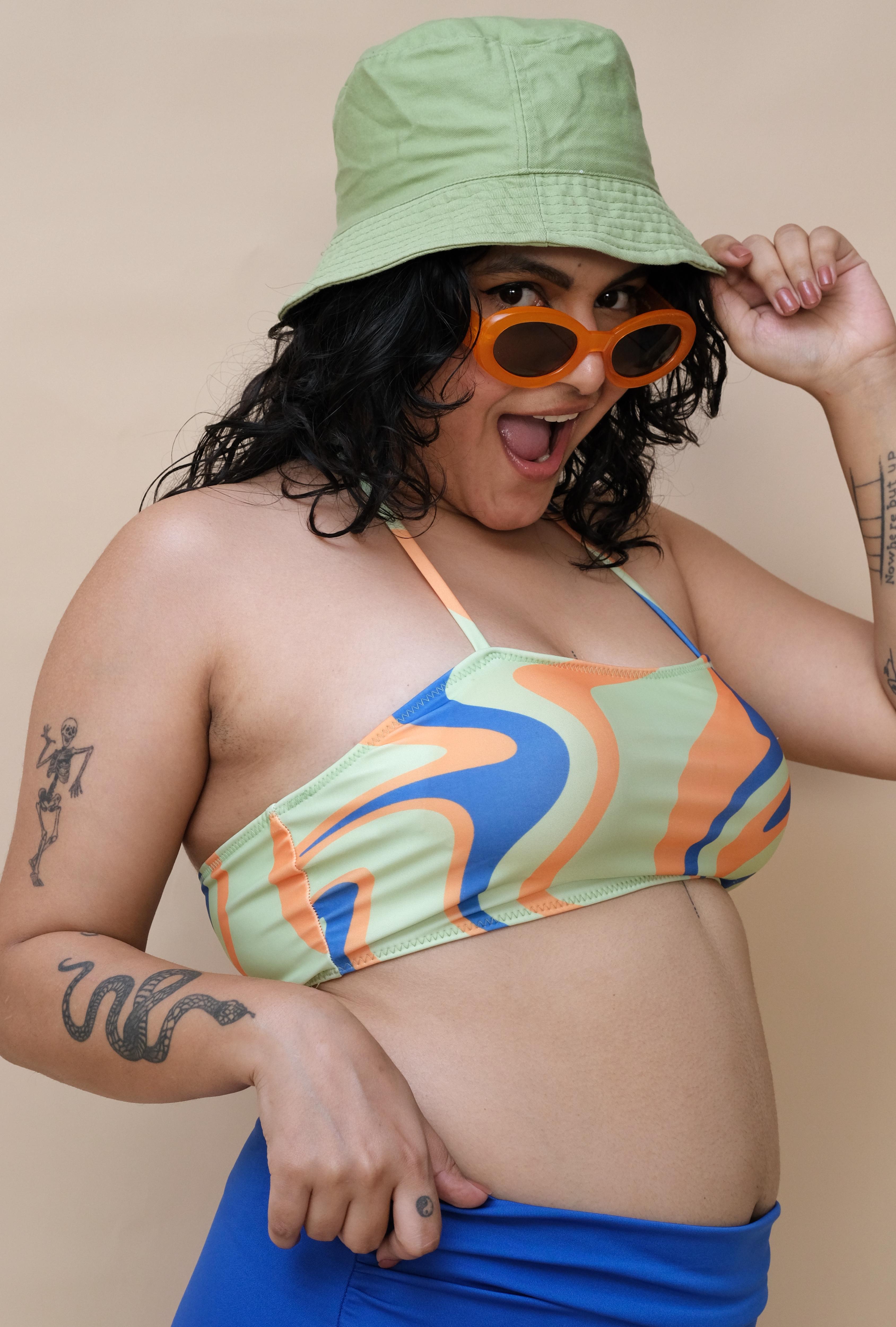 Woman wearing a colorful bikini top 