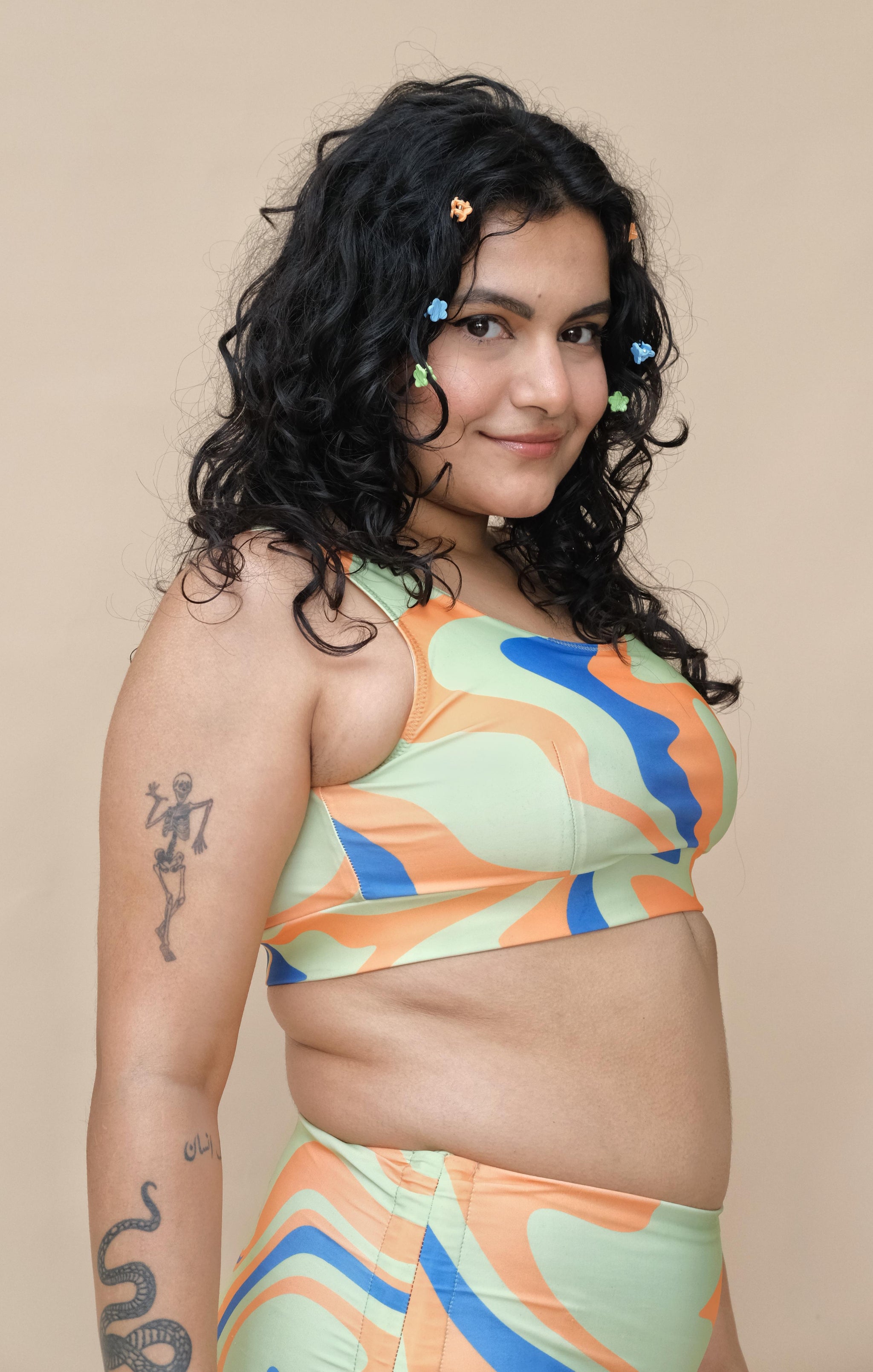 Woman wearing a colorful patterned top