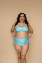 Woman wearing a blue bikini set 