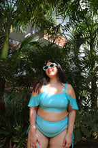 Woman in a blue bikini set