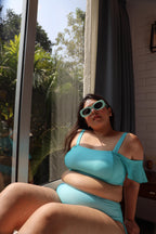 Woman in a blue bikini set