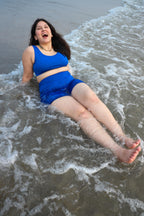 Woman in a blue swimsuit 