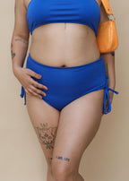 Woman wearing a blue bikini