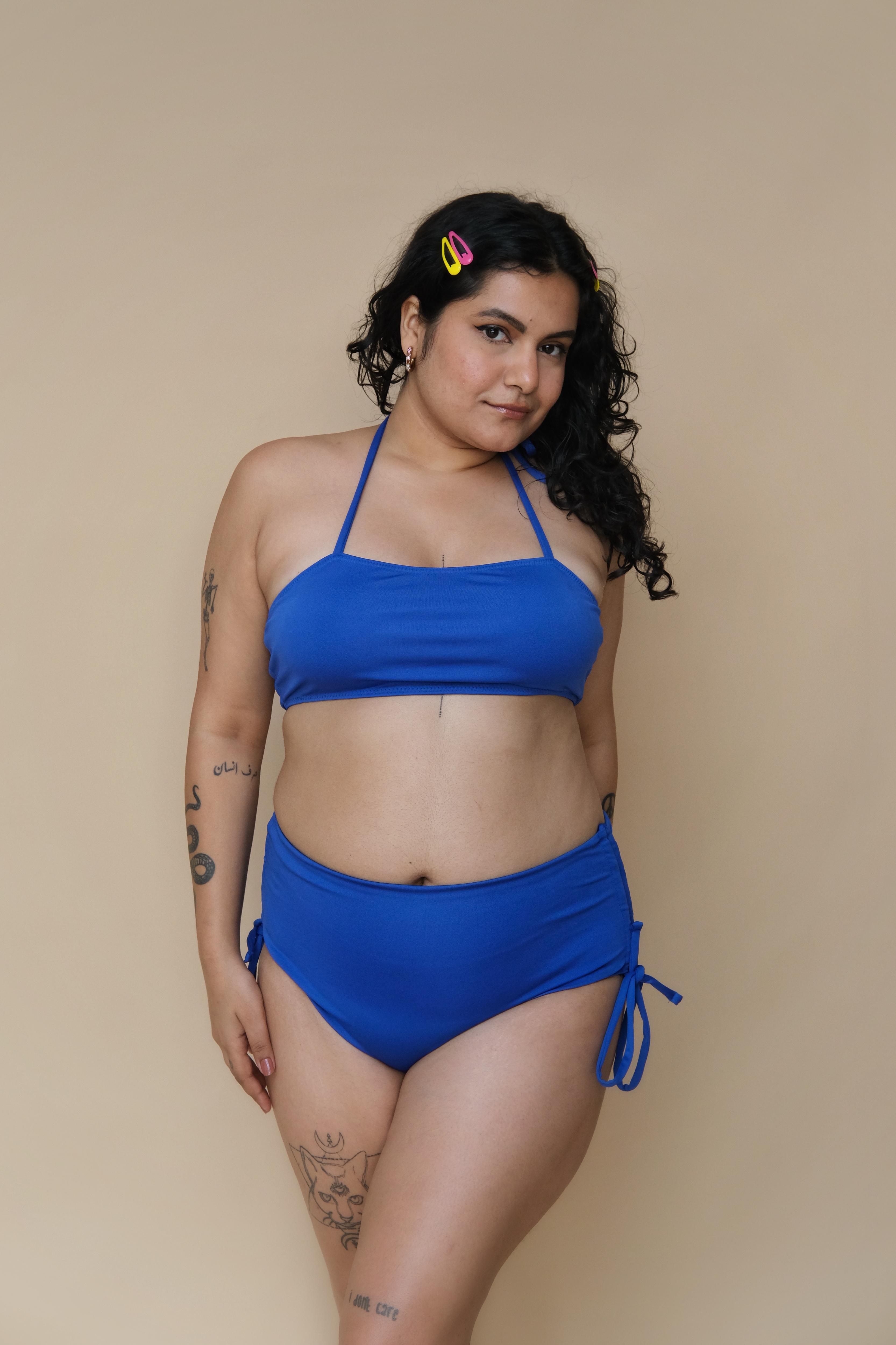 Woman wearing a blue bikini set