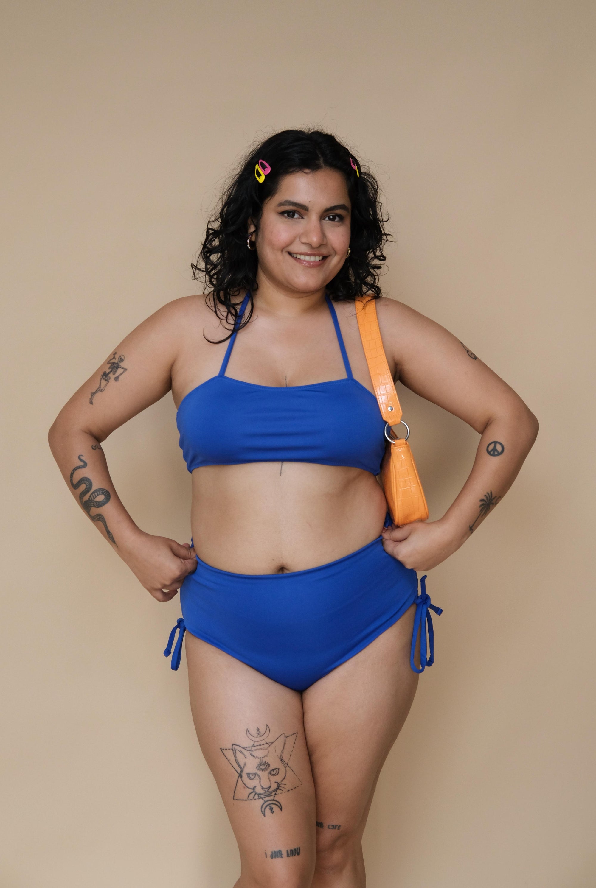 Plus size wearing a blue bikini set