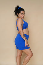 Plus size woman wearing a blue outfit 