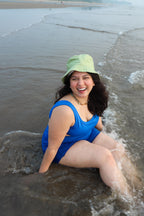 Woman in a blue swimsuit set