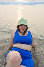woman in a blue swimsuit 