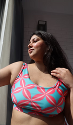 Woman wearing a colourful patterned top 