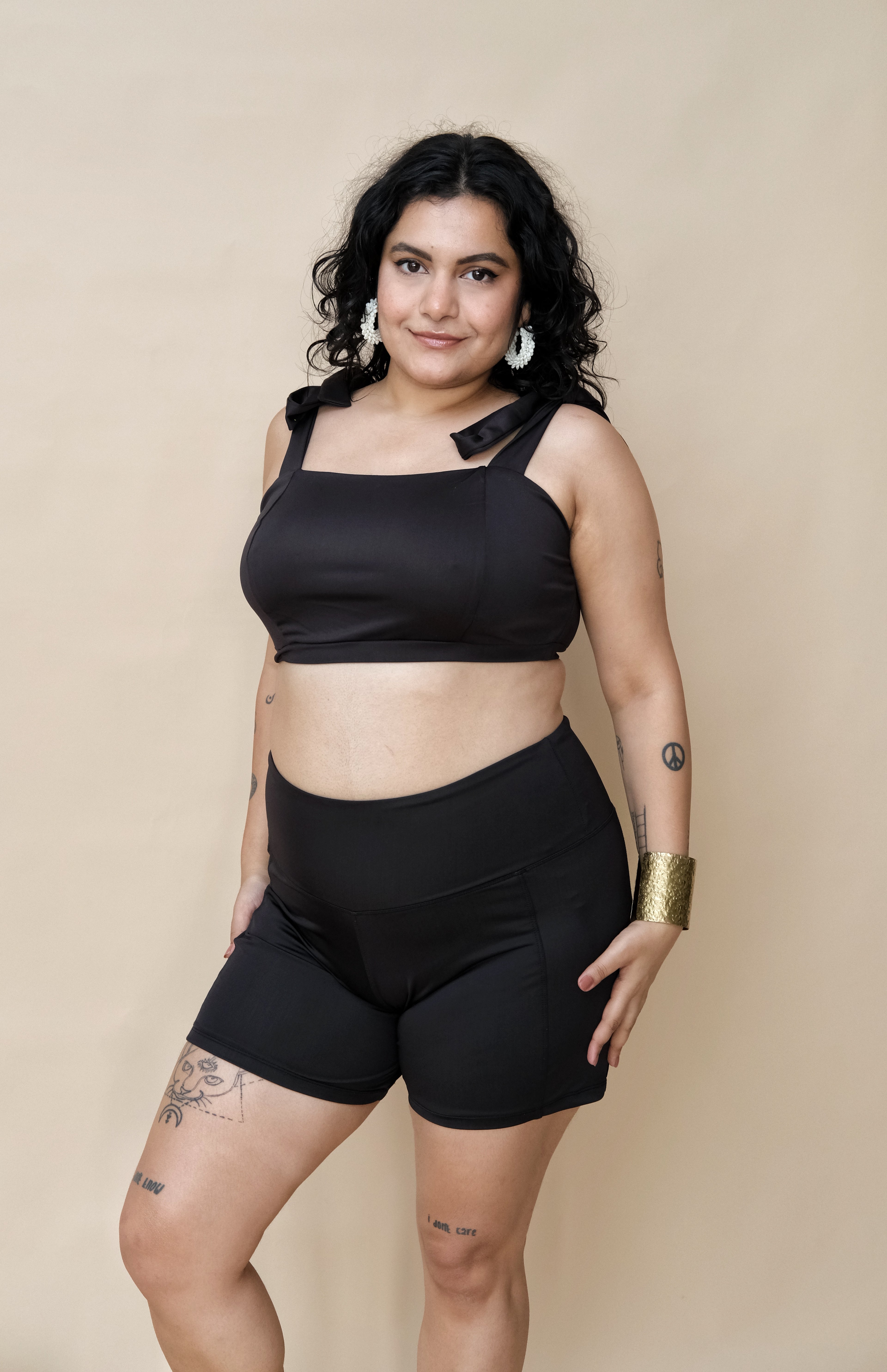 Woman wearing a black swimwear set