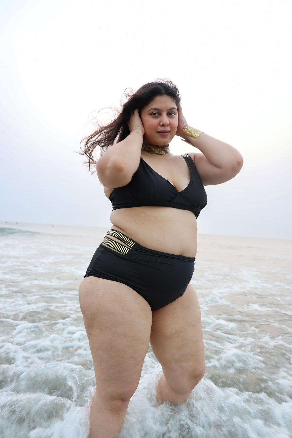 Woman in a black swimsuit 