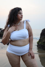 Curvy Asian woman in a white bikini 