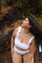 Woman in a white bikini set