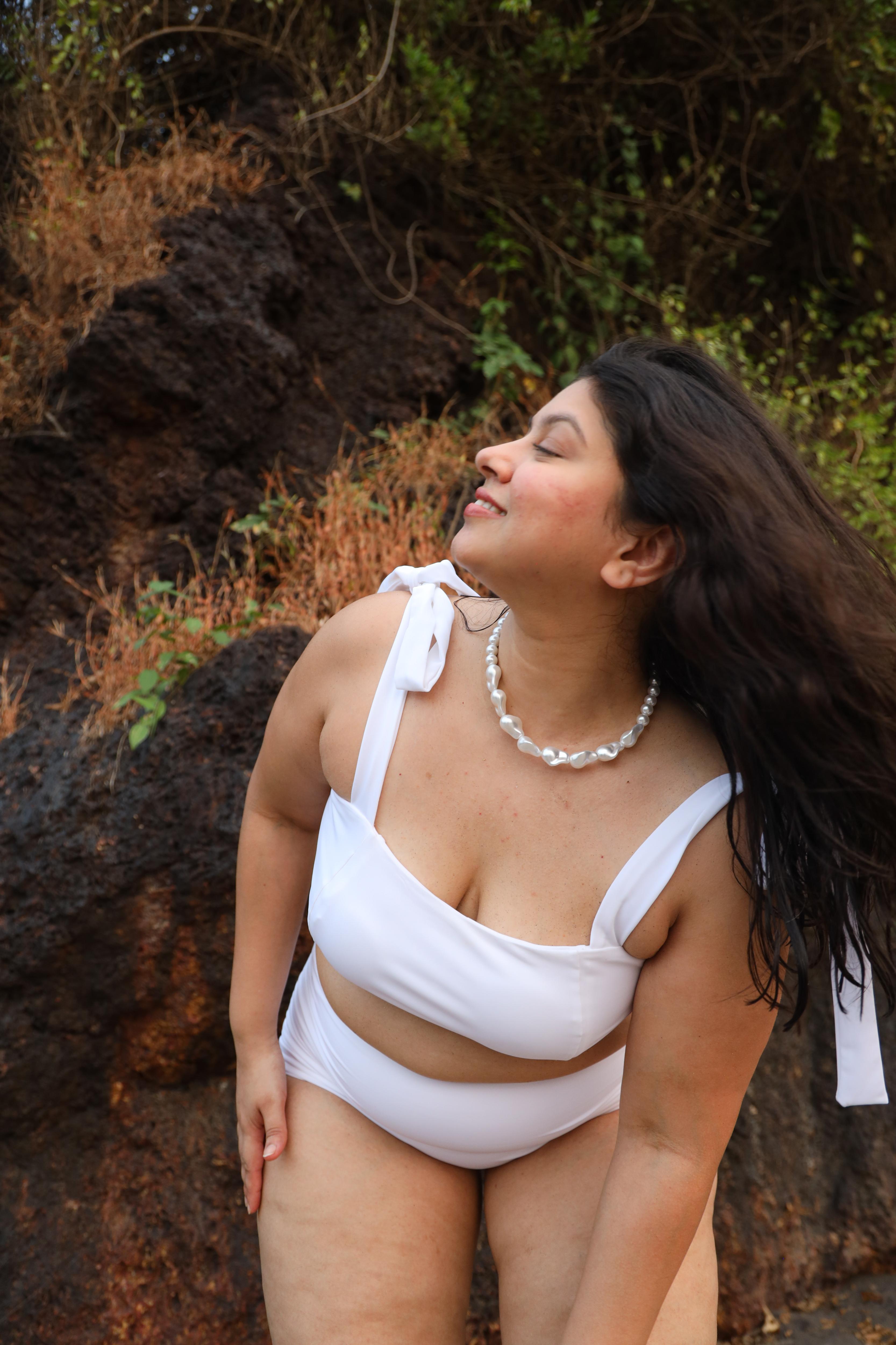 Woman in a white bikini set