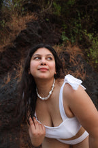 Woman in a white outfit 