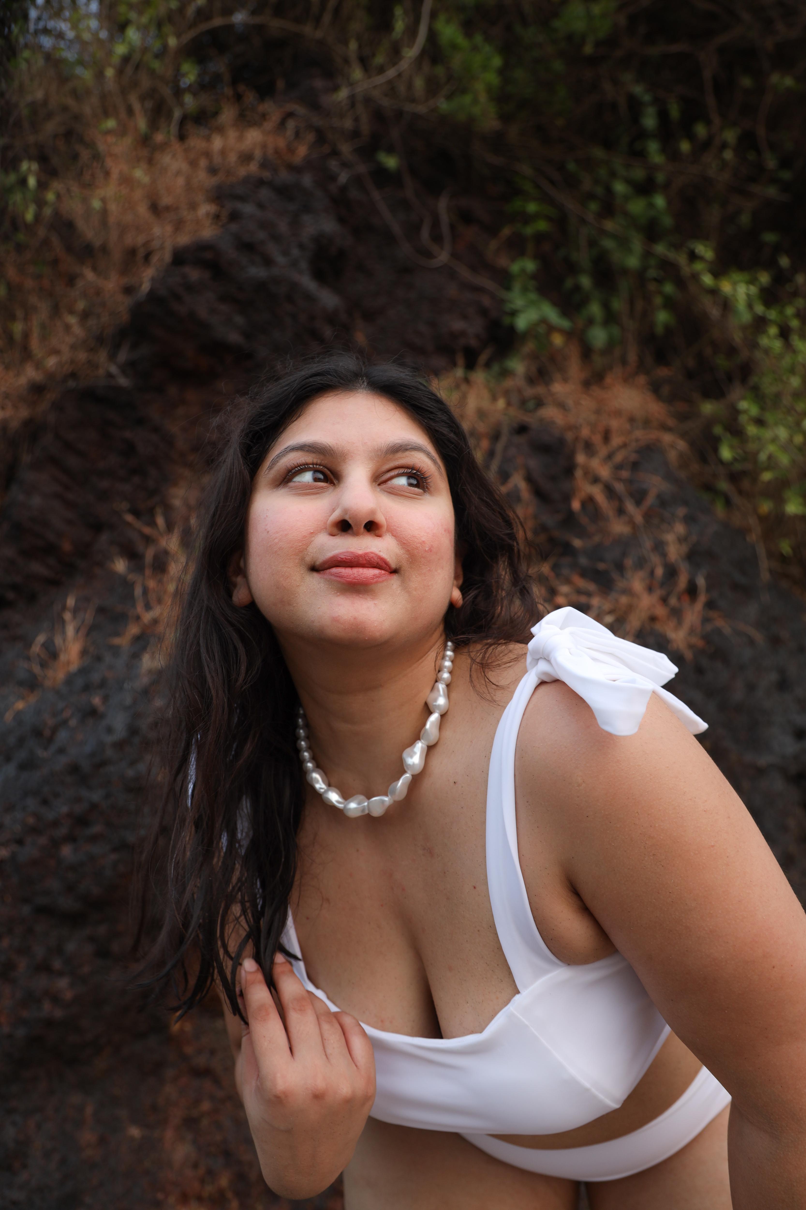 Woman in a white outfit 