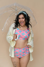 Woman in a pink and blue bikini set